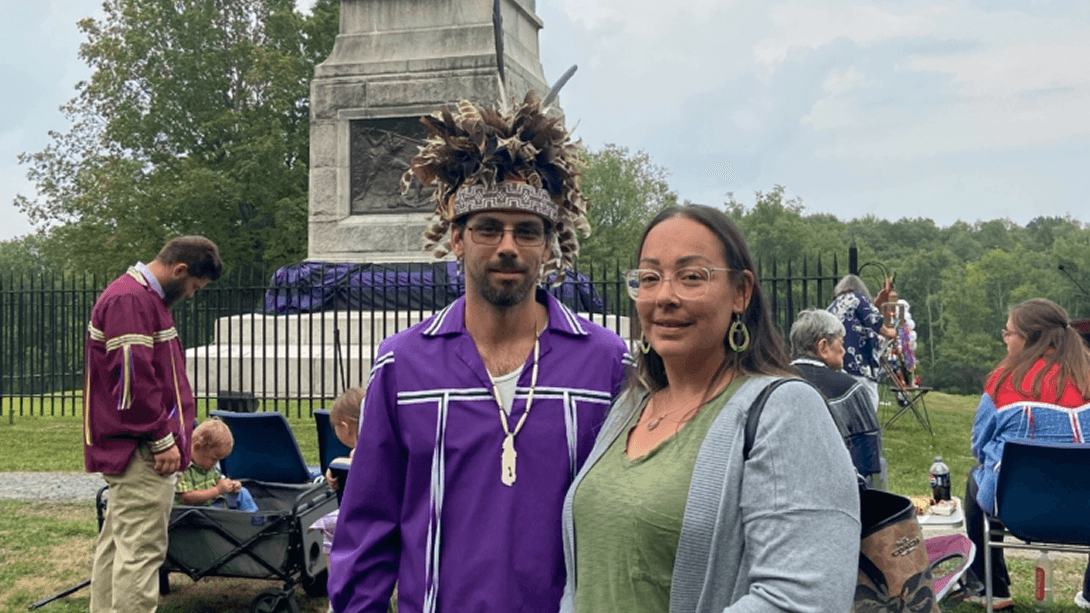 People in front of monument